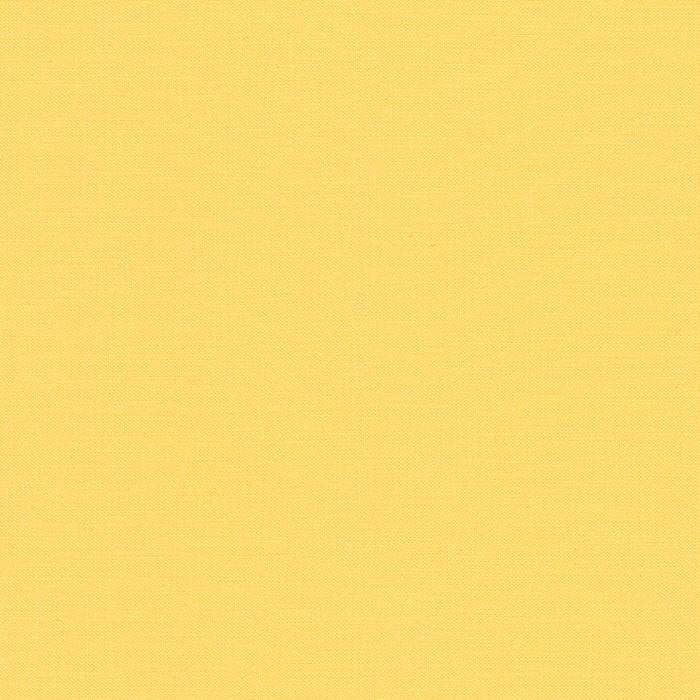 Buttercup  Kona Cotton Solid - K001-1056 by Robert Kaufman - Sold in 1/2 yard increments, continuously cut